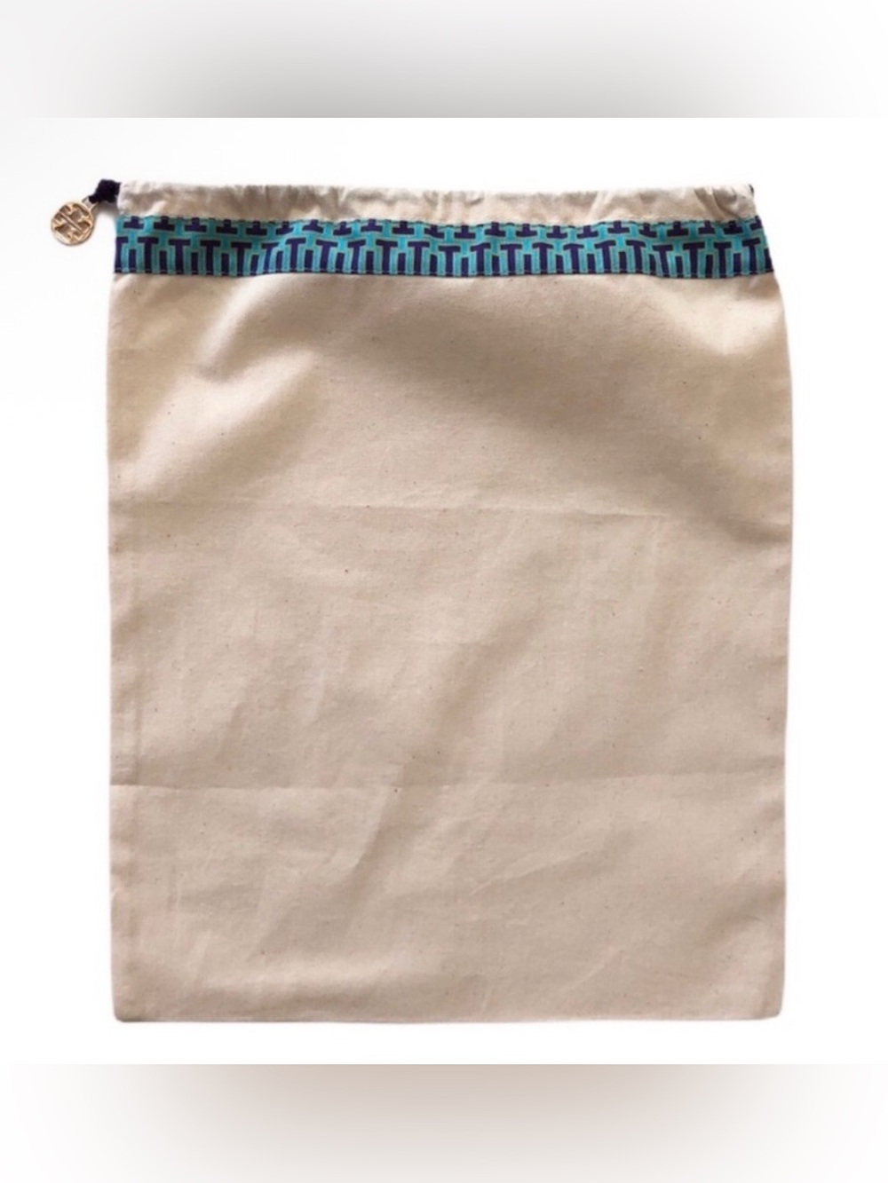 NWOT Tory Burch canvas travel dust bag.   15” x 11 3/4”